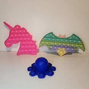 Variety of colorful shaped pop-it's